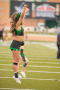 Thumbnail image of item number 1 in: '[North Texas Cheerleader jumping]'.