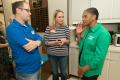 Photograph: [Dorothy Bland Talking With Two Former UNT Students]