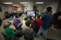 Photograph: [Students playing Super Smash Brothers]