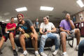 Photograph: [Students laughing while playing video games, 2]
