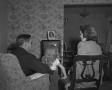 Photograph: [A family watching television, 3]