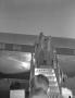 Photograph: [Bob Hope Exiting a Plane]