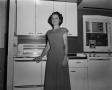 Photograph: [Margaret McDonald with Hotpoint stove]