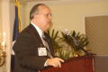 Primary view of [Bob Carlquist standing in front of microphone]