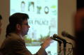 Photograph: [Jim Lenahan giving a presentation at a TDNA conference]