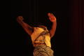 Photograph: [Photograph of a man dancing in checker-print pants, 4]