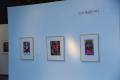 Photograph: [Photograph of a Caribbean gallery wall, featuring three art works]