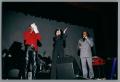 Photograph: [Curtis King and two other unknown individuals onstage]