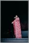 Photograph: [Full shot of Angela Bofill in a pink dress onstage]