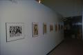 Thumbnail image of item number 1 in: '[Photograph of an African gallery wall, featuring of seven art works]'.