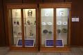 Photograph: [Crime-related Artifacts display cases]