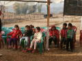 Primary view of Children Participating in First Death Anniversary Ceremony