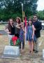 Photograph: [Polk family at grave]