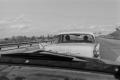 Photograph: [Photograph of a car driving down a highway, 2]