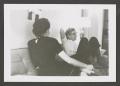 Photograph: [Photograph of Doris and Sarah talking on a couch, 2]
