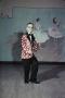 Photograph: [Boy in red polka-dot suit jacket and glasses, 2]