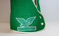 Photograph: [Green Jackets vest, emblem closeup]