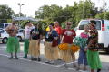 Photograph: [Supporters in grass skirts at the second LSRFA pit-stop]
