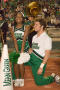 Photograph: [NT Cheer pair at rest during Homecoming game, 2007]