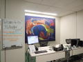 Photograph: [Front desk and mural in MC office 2]
