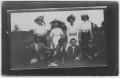 Photograph: [Four women and four men posing together, 2]