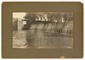 Photograph: [Body of water with a man-made waterfall]