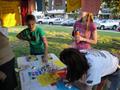 Photograph: [People decorating shirts, 2011 Denton Friends of the Family 1]