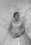 Photograph: [Portrait of Jane Williams in a wedding dress, holding a bouquet, 5]