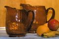 Thumbnail image of item number 1 in: '[Brown amber vases with fruit, 2]'.