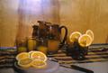 Photograph: [Brown amber glasses and sliced oranges]