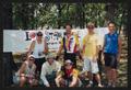 Photograph: [Group of 7 standing by an LSR banner in a park: Lone Star Ride 2003 …