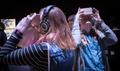 Photograph: [Two people wearing headphones at the Intermedia Performance Art Clas…