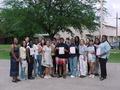 Photograph: [ILD students pose with certificates]