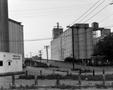Photograph: [Grain silos on S. Main St. in Fort Worth]