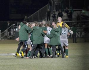 Primary view of object titled '[UNT women's soccer team celebrates win against Denver, 1]'.