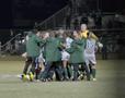 Photograph: [UNT women's soccer team celebrates win against Denver, 1]