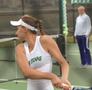 Photograph: [Kseniya Bardabush swings backhand during tennis match]