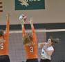 Photograph: [SHSU players attempt to block hit by Madison Barr]