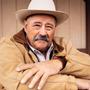 Photograph: [Portrait of Barry Corbin posing with his arms crossed]