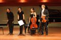 Primary view of [Students stand after Piano Quartet in E-flat major, Op. 47 performance]
