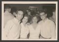 Photograph: [Group of four individuals at a party]