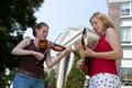 Primary view of [Harmonious Melodies: Joyful Musicians Serenade Henderson County Courthouse]