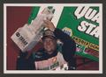 Primary view of [Steve Kinser posing with a trophy]