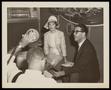 Photograph: [Men and Woman at American Airlines]