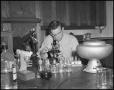 Primary view of [Ernest Edwards at Microscope]