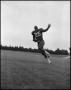Thumbnail image of item number 1 in: '[Football Player No. 25 Running with a Football, September 1962]'.