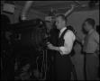 Photograph: [Two Men in a Projection Booth]