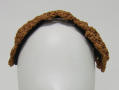 Thumbnail image of item number 2 in: 'Headpiece'.