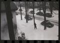 Photograph: [Man walking through the snow]