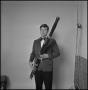 Photograph: [UNT band tour member holding a bassoon, 9]